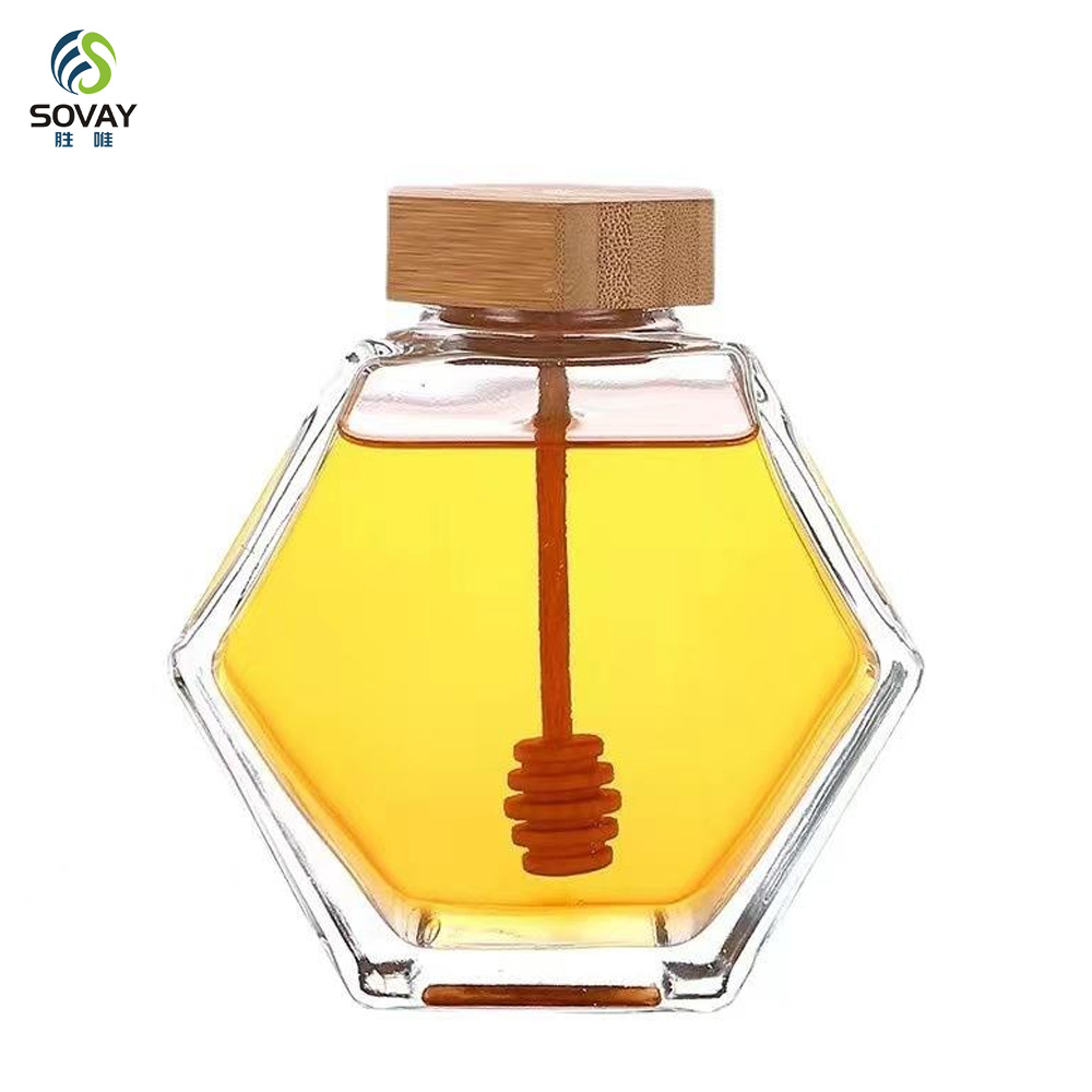 SG10N Wholesale Honey Jar Glass Hexagon Shape Honey Jar Glass with Wooden Dipper and Cork Lid Cover Honey Syrup Storage