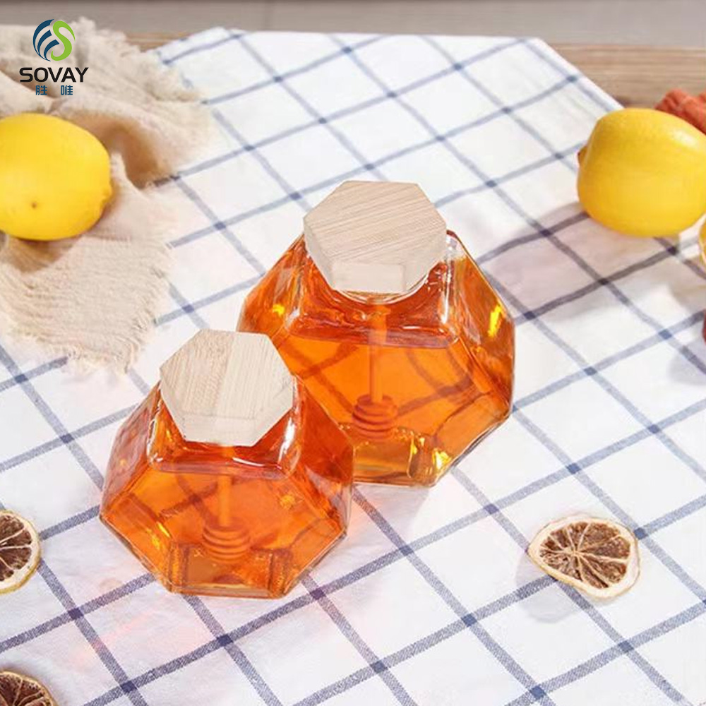 SG10N Wholesale Honey Jar Glass Hexagon Shape Honey Jar Glass with Wooden Dipper and Cork Lid Cover Honey Syrup Storage