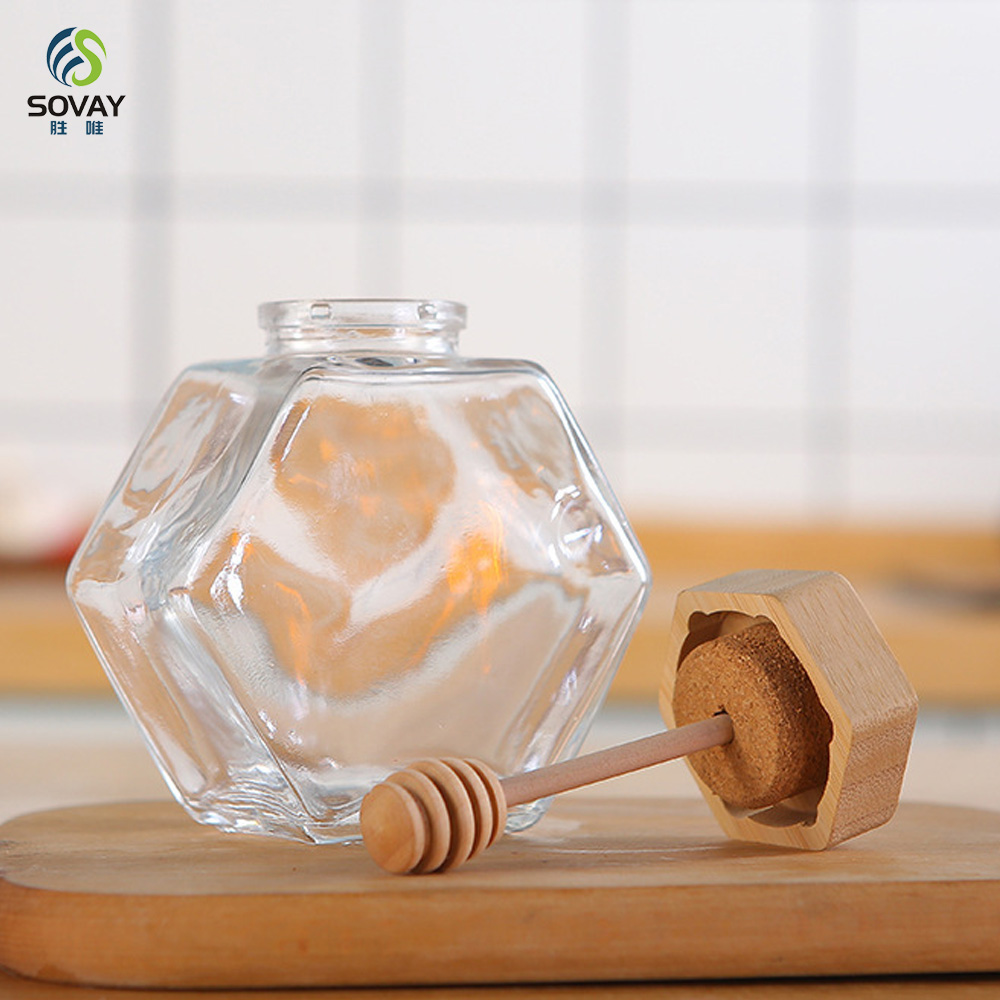 SG10N Wholesale Honey Jar Glass Hexagon Shape Honey Jar Glass with Wooden Dipper and Cork Lid Cover Honey Syrup Storage