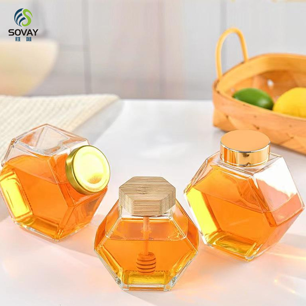 SG10N Wholesale Honey Jar Glass Hexagon Shape Honey Jar Glass with Wooden Dipper and Cork Lid Cover Honey Syrup Storage